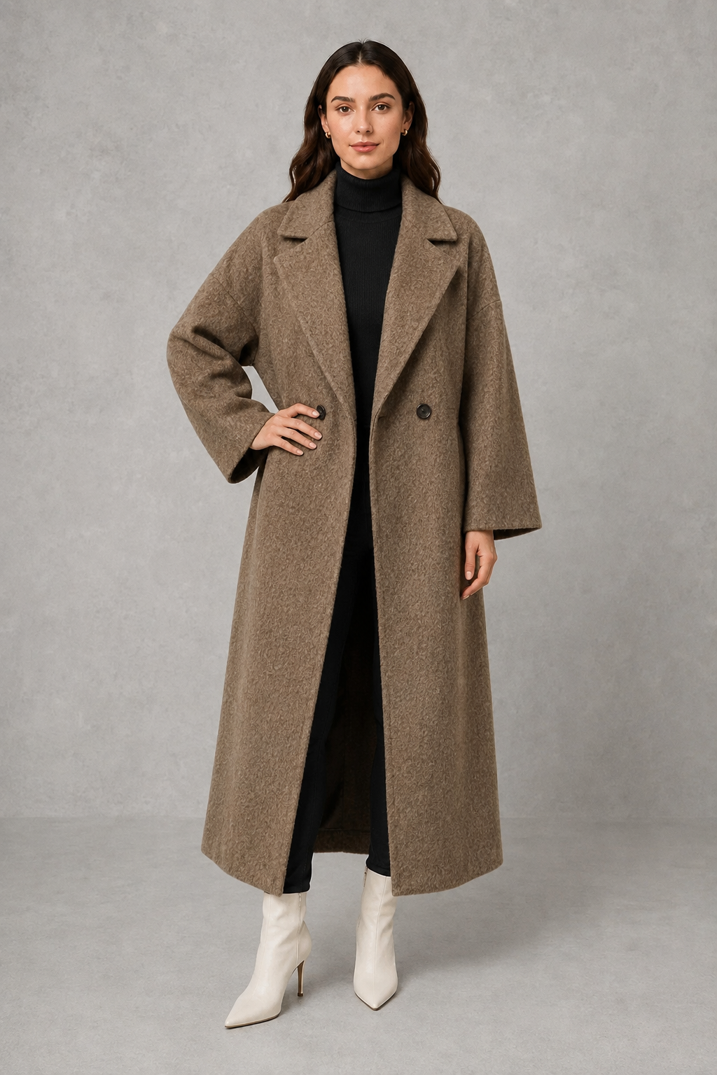 Women’s classic wool maxi coat with a relaxed longline silhouette, traditional button-front closure and clean minimalist finish.