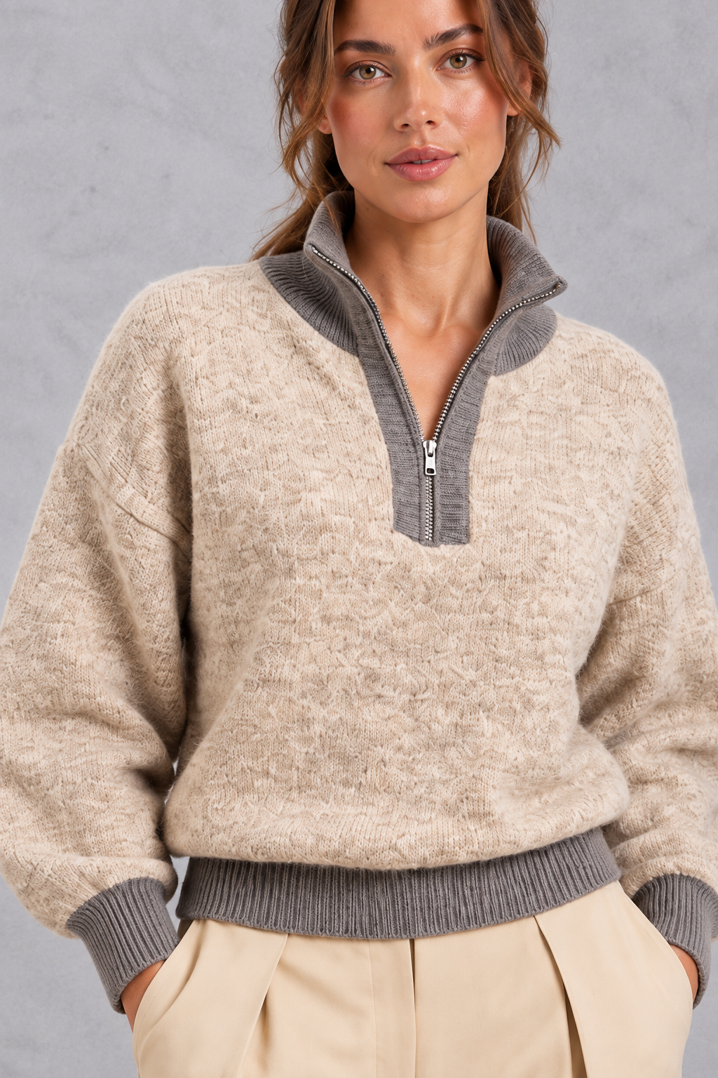 Close-up of contrast gray stand collar and zip