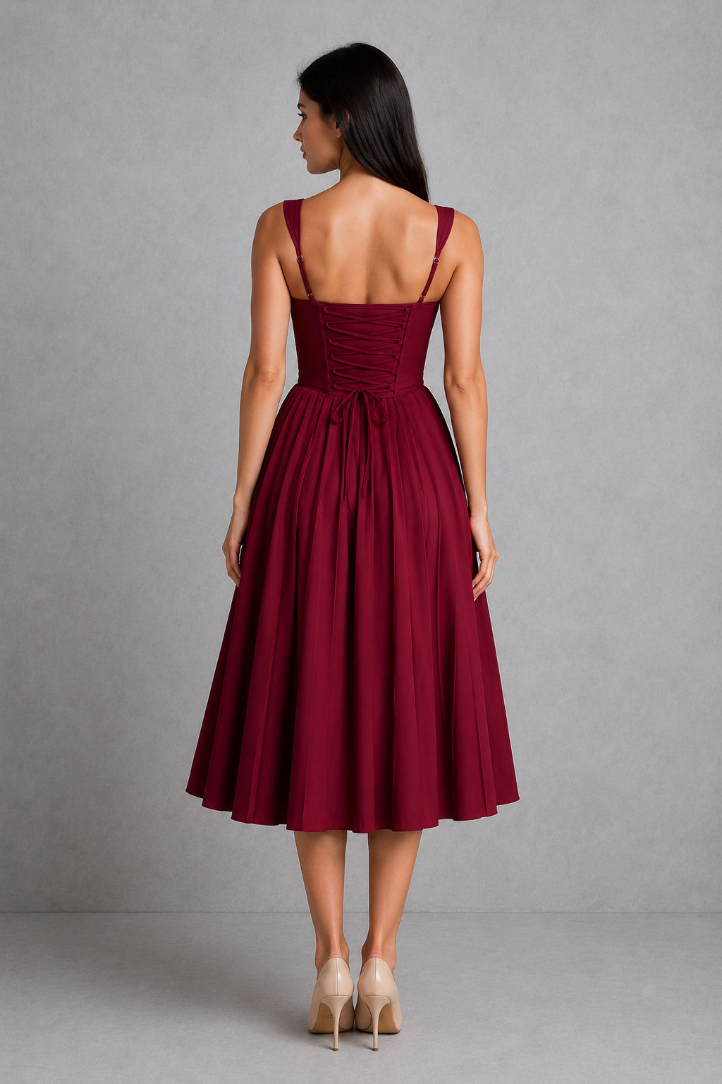 Women's corset midi dress featuring a structured boned bodice, sweetheart neckline, gathered tie-front cups, fan-shaped adjustable straps, lace-up back, and a flowing knife-pleated skirt, designed for elegant occasion and party wear.