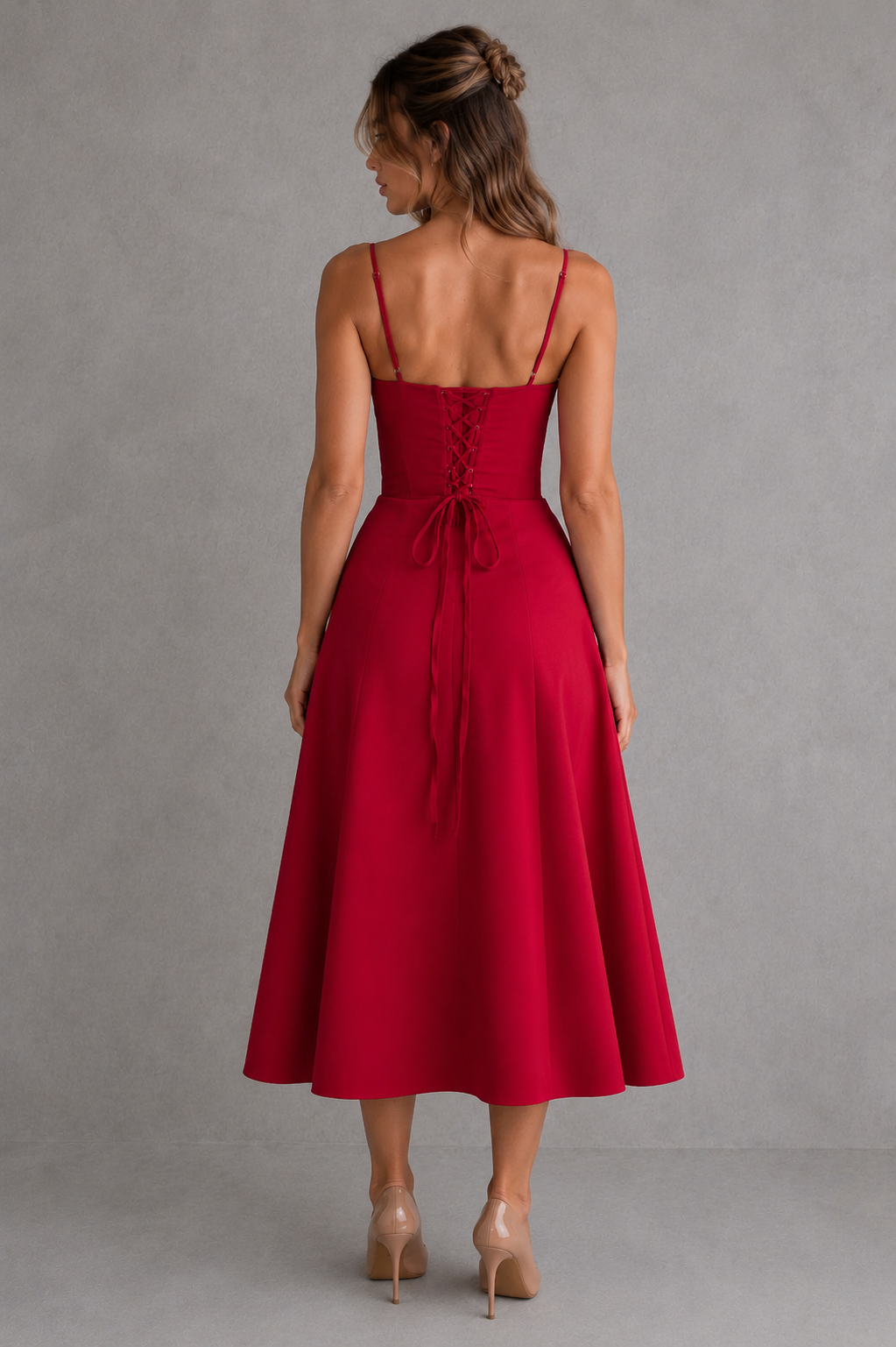 Women’s corset midi dress with gathered bust, adjustable drawstring detail, fitted waist, flowing skirt, and thigh-high split.