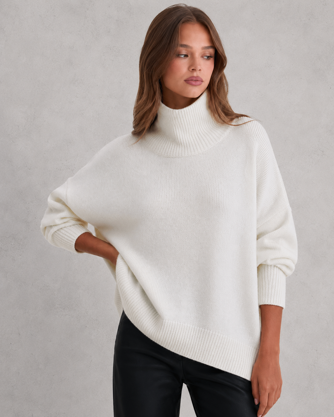 Women's cozy knitted turtleneck sweater in a relaxed, feminine silhouette with a softly structured fit. Features a refined high neckline, rich textured knit, and clean minimalist design that offers warmth and breathable comfort. A versatile wardrobe essential styled effortlessly with tailored trousers, denim, boots, or accessories for polished everyday wear from office settings to casual outings.