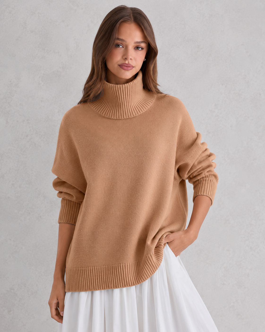 Women's cozy knitted turtleneck sweater in a relaxed, feminine silhouette with a softly structured fit. Features a refined high neckline, rich textured knit, and clean minimalist design that offers warmth and breathable comfort. A versatile wardrobe essential styled effortlessly with tailored trousers, denim, boots, or accessories for polished everyday wear from office settings to casual outings.