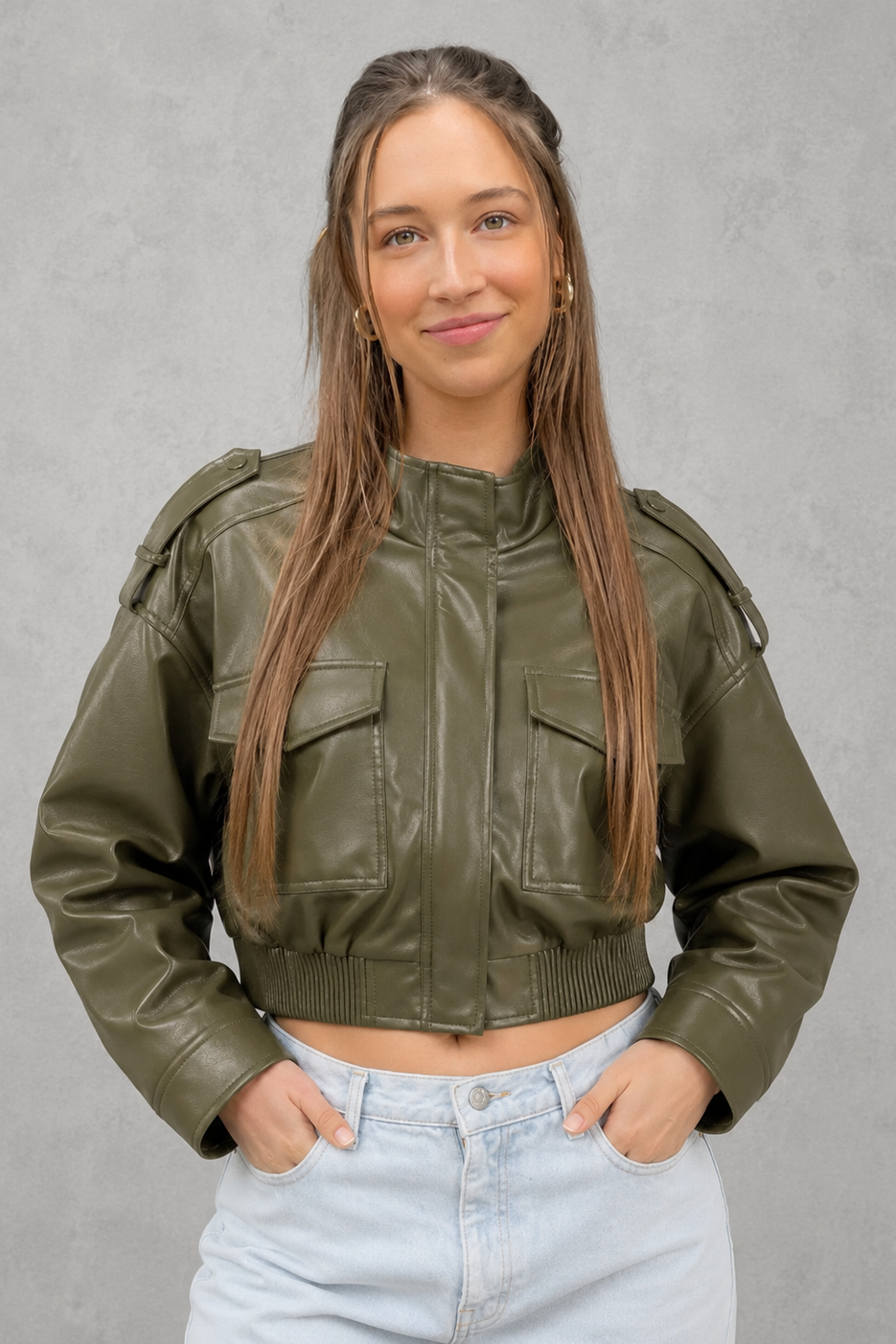Women’s cropped faux leather bomber jacket with zip-front closure, functional pockets, ribbed cuffs and hem, and a relaxed leather-look finish.