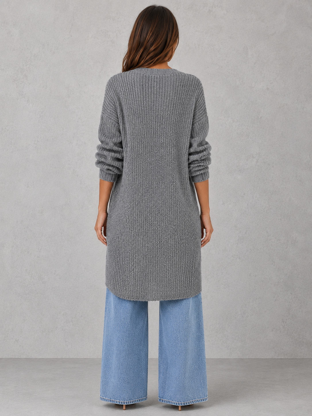 Women's soft luxury knit top with an elegant draped neckline, relaxed fit, and sophisticated silhouette for effortless day-to-evening styling.