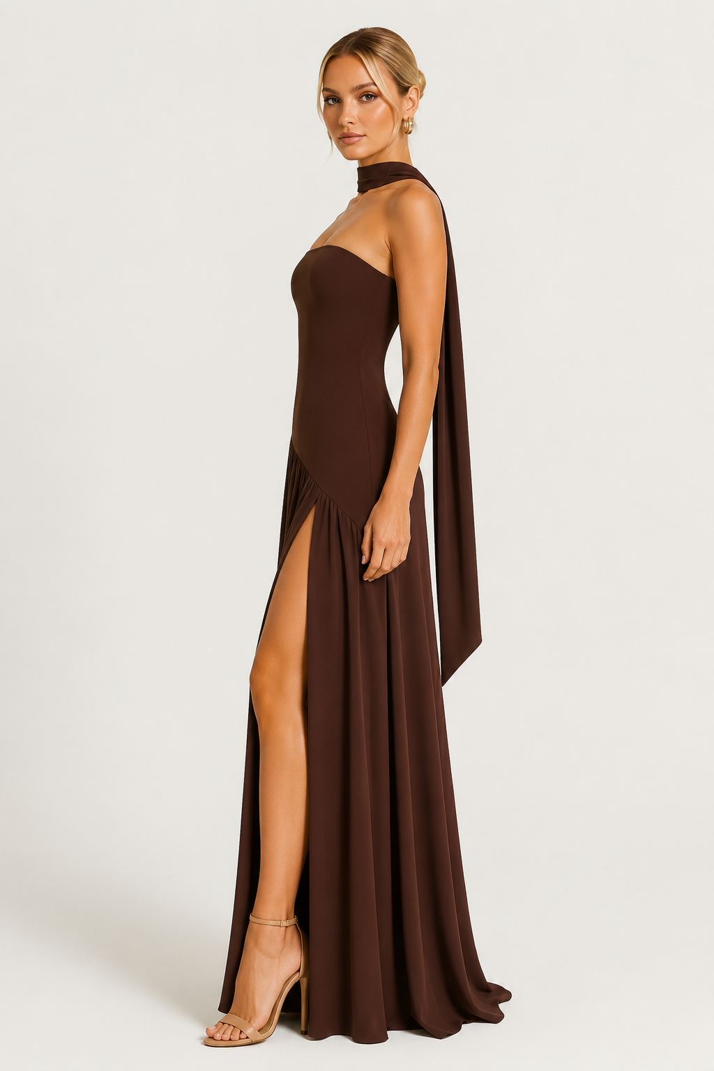 Women's strapless draped satin maxi dress with a fitted bodice and flowing full-length skirt, creating an elegant silhouette ideal for formal events, evening occasions, and celebrations.