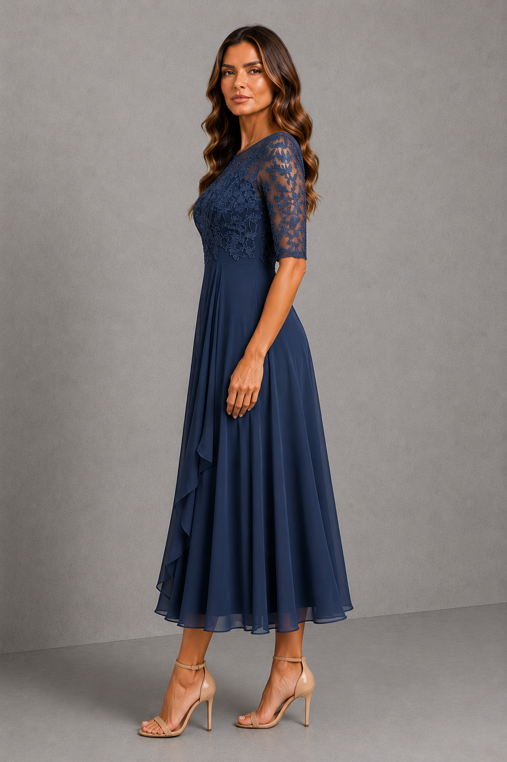 Women’s embroidered lace midi dress with illusion neckline, sheer three-quarter sleeves, fitted waist and flowing chiffon skirt.