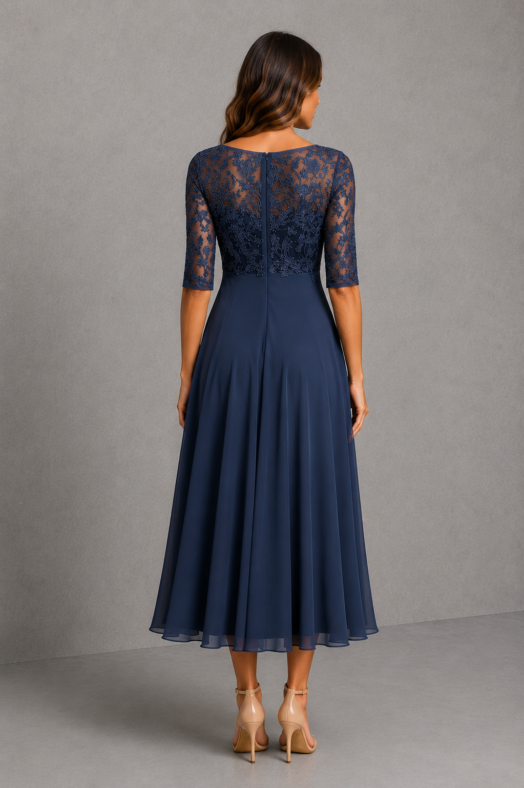 Women’s embroidered lace midi dress with illusion neckline, sheer three-quarter sleeves, fitted waist and flowing chiffon skirt.