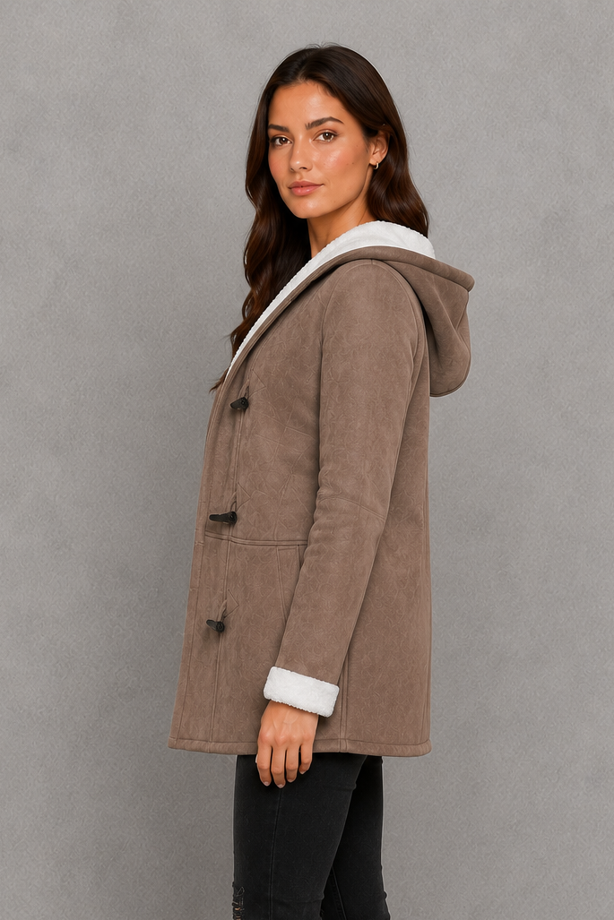 Women’s fleece-lined hooded toggle coat with a soft warm interior, practical hood, classic toggle fastenings, and comfortable regular-fit silhouette.