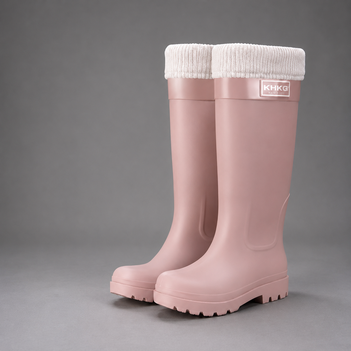 Women’s fleece-lined waterproof rain boots with tall PVC construction, a roomy round toe and deep-tread slip-resistant outsole.