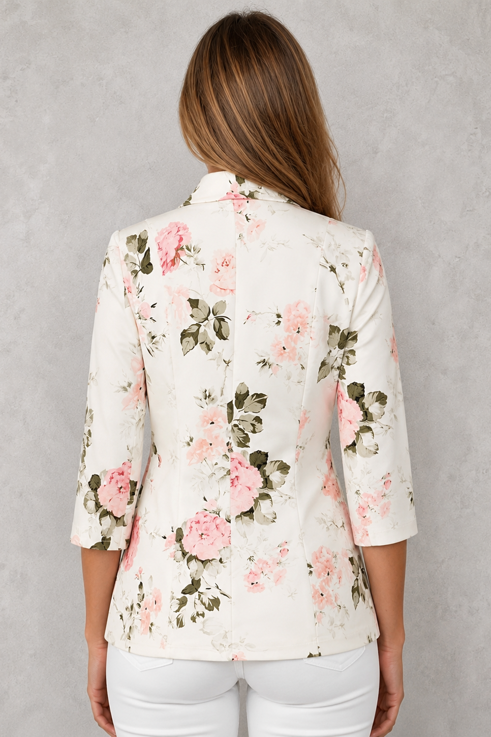 Women’s floral tailored blazer with an all-over floral print, classic notched lapels, 3/4-length sleeves, and a lightweight fitted silhouette.
