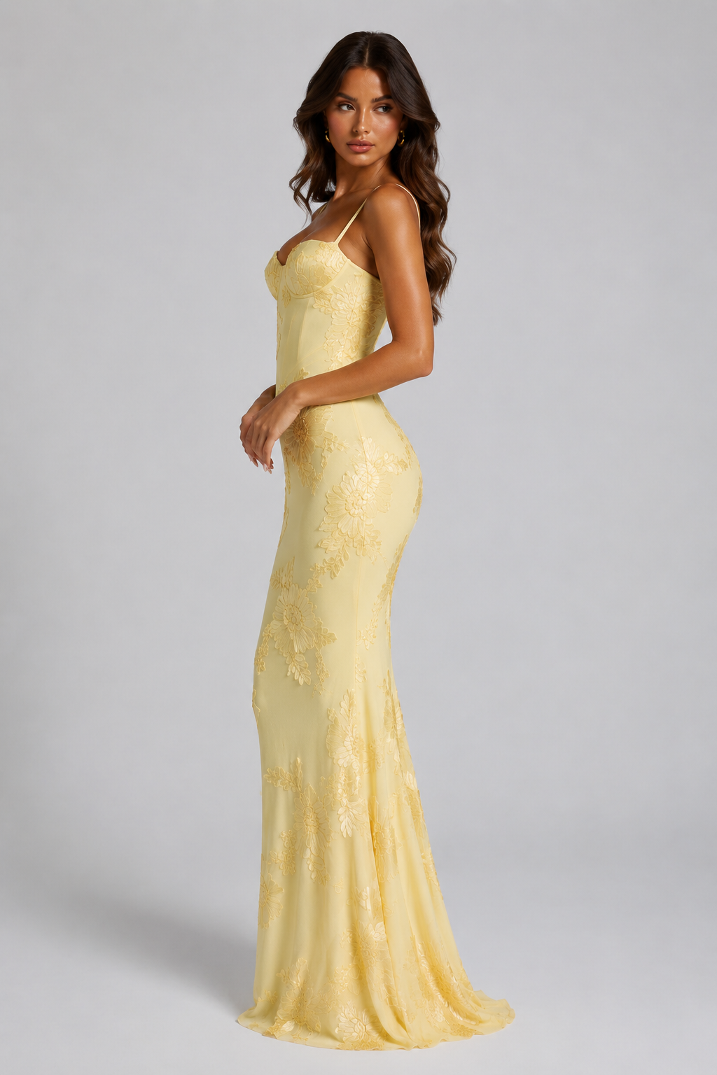 Women's floral embroidered corset maxi dress featuring a fitted corset-inspired bodice, delicate shoulder straps, textured floral embroidery, and a flowing maxi skirt, ideal for weddings, formal events, and special occasions.