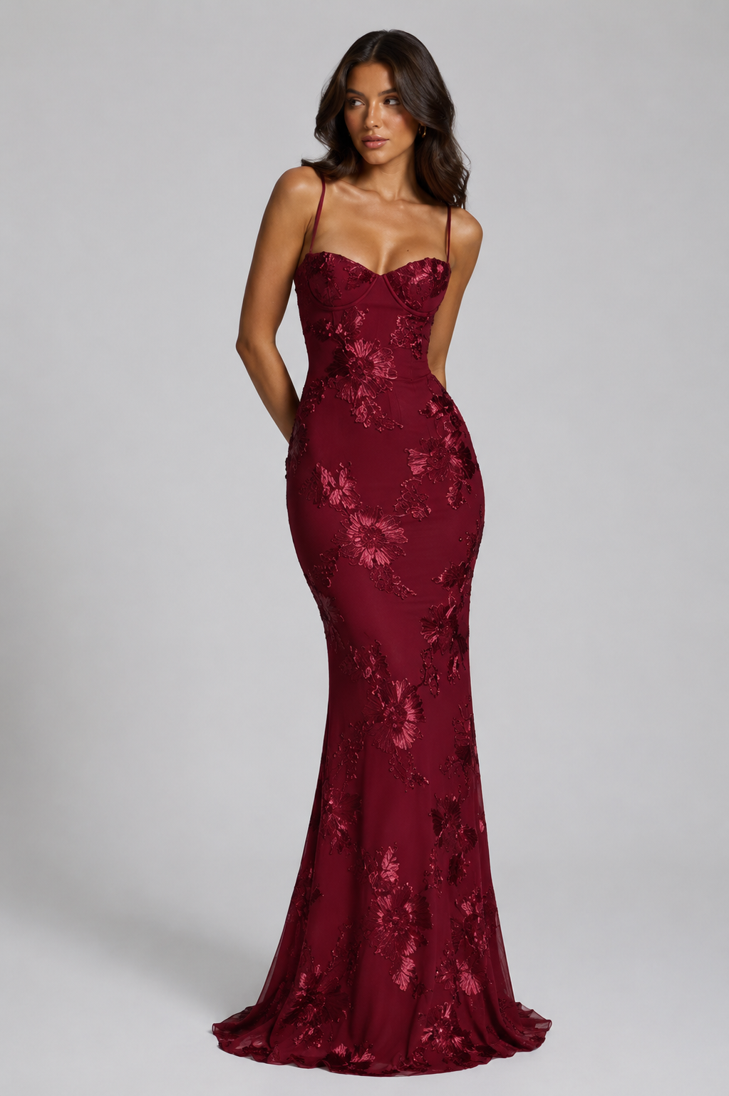 Women's floral embroidered corset maxi dress featuring a fitted corset-inspired bodice, delicate shoulder straps, textured floral embroidery, and a flowing maxi skirt, ideal for weddings, formal events, and special occasions.
