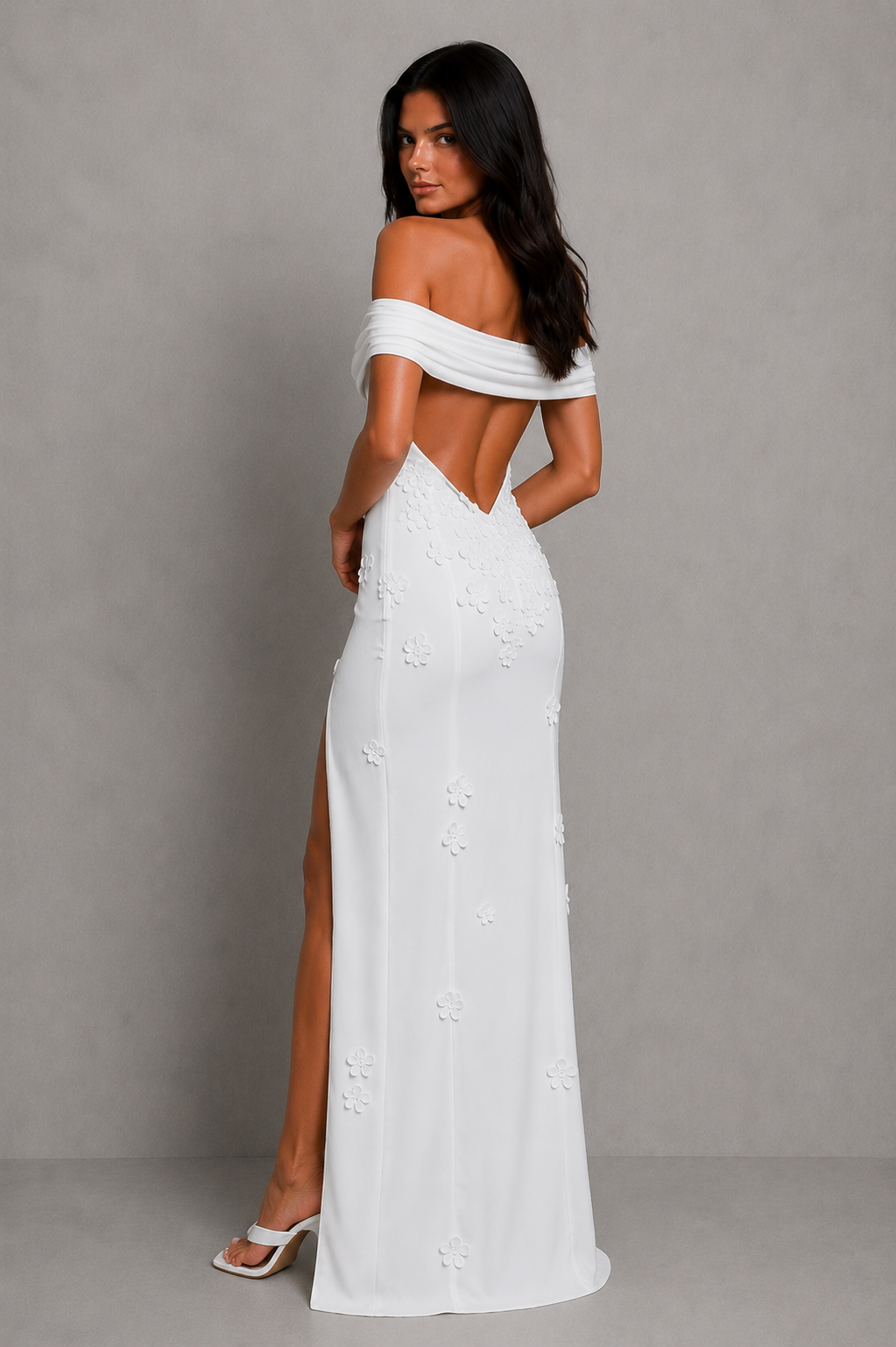 Women's floral mesh Bardot maxi dress featuring elegant 3D floral appliqués, an off-the-shoulder neckline, fitted bodice, open low-back detail, flowing maxi skirt, thigh-high split, and soft stretch mesh fabric for formal occasions and evening events.