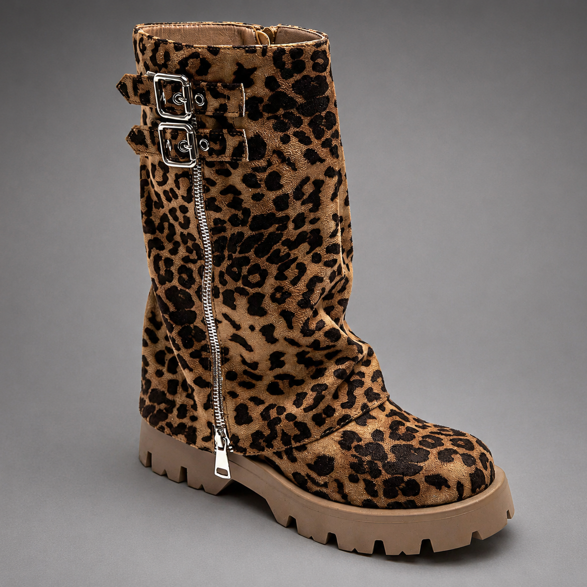 Women’s genuine leather knee-high biker boots with a supple leather upper, long external zipper, double buckle accents, and sturdy sole.