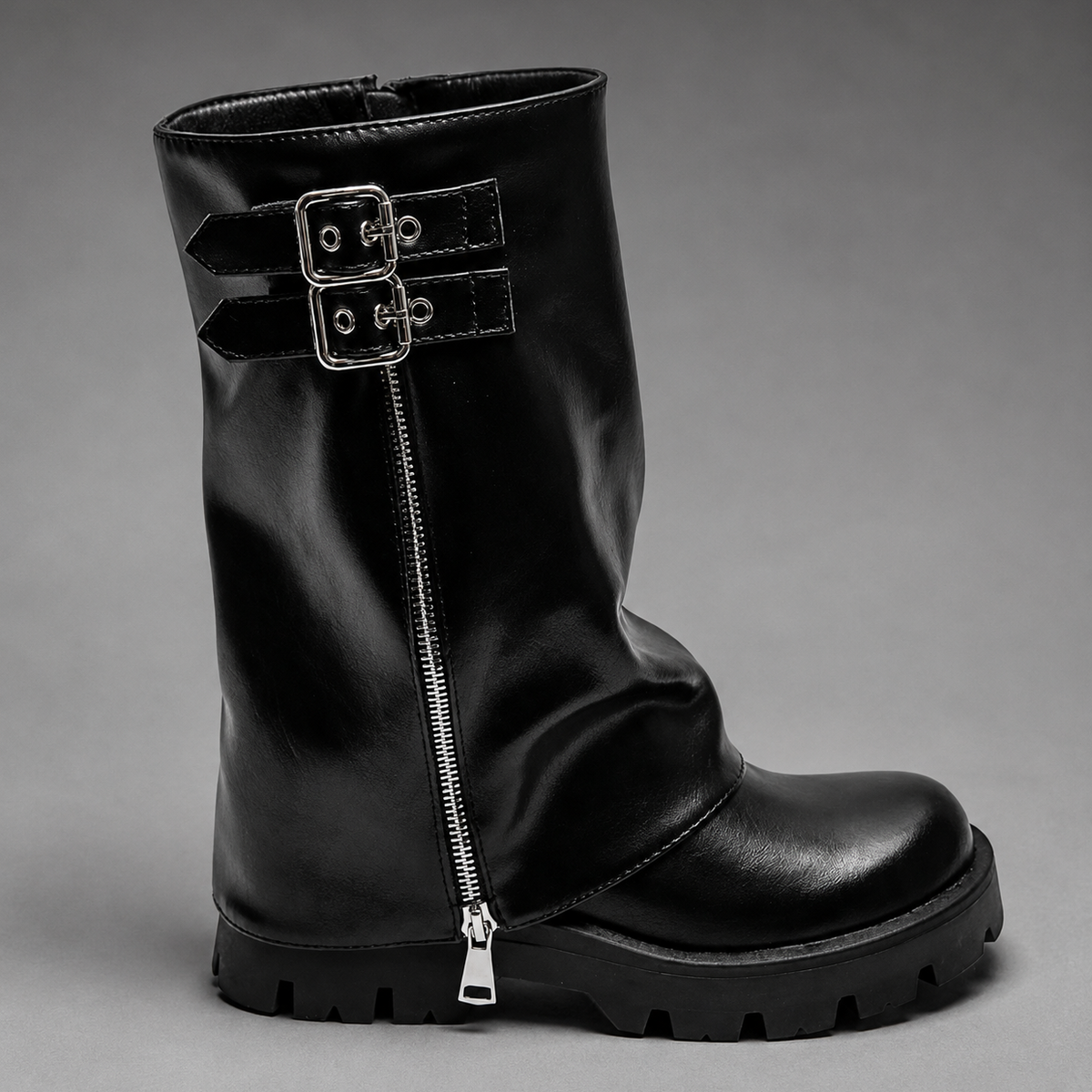 Women’s genuine leather knee-high biker boots with a supple leather upper, long external zipper, double buckle accents, and sturdy sole.
