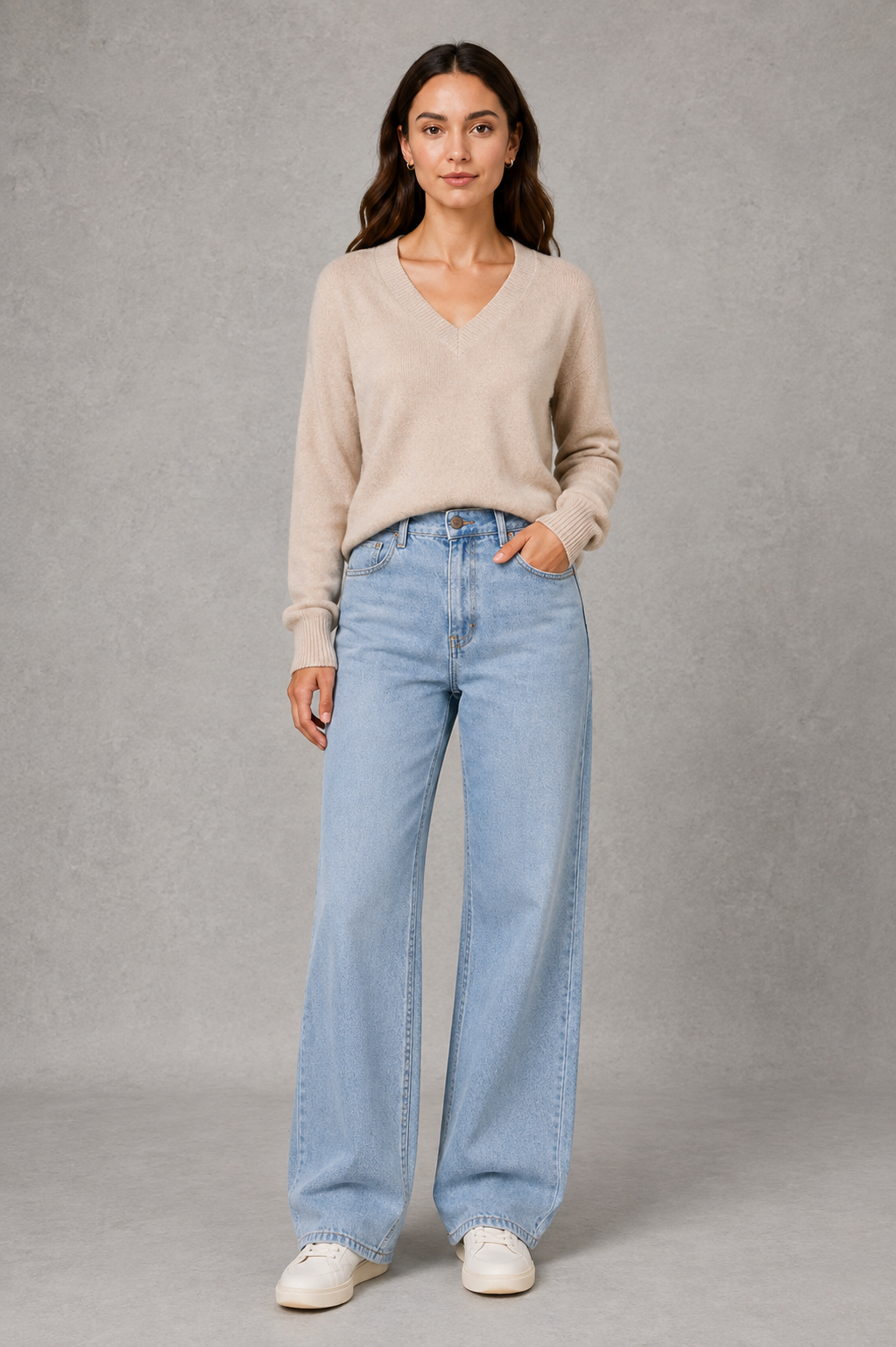 Women’s high-waisted wide-leg jeans with a light wash, high-rise waist, relaxed straight legs, five-pocket design, and classic button-and-zip closure.
