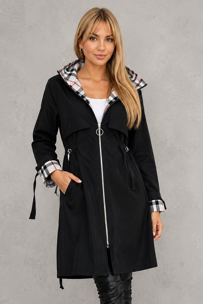 Women’s hooded waterproof rain jacket with a lightweight windproof design, full front zipper, soft lining, and flattering tailored silhouette.