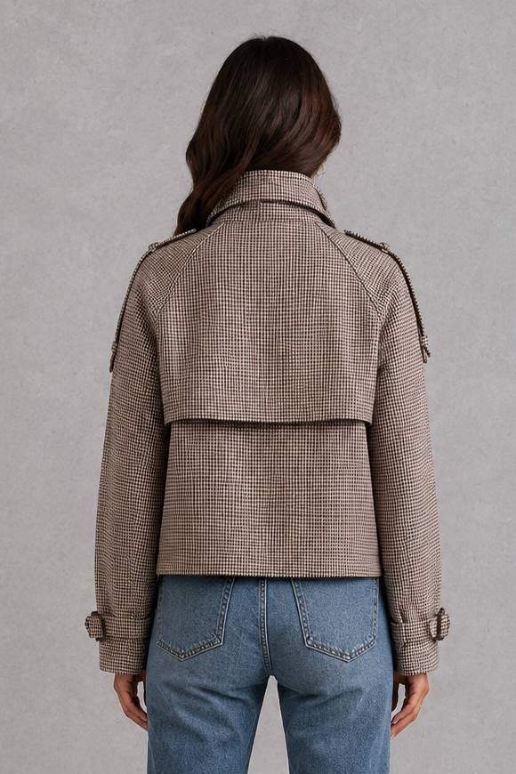 Women’s houndstooth button coat with a classic woven pattern, elegant high neckline, front button detailing, and structured tailored silhouette.