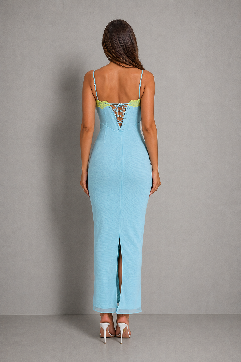 Women’s bodycon maxi dress with floral lace trim, bustier-style bodice, adjustable lace-up back, and figure-hugging silhouette.