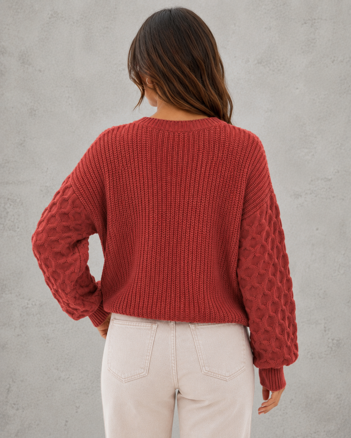 Women's relax fit spring sweater with textured lantern sleeves, soft knit construction, and relaxed silhouette for elegant everyday wear.