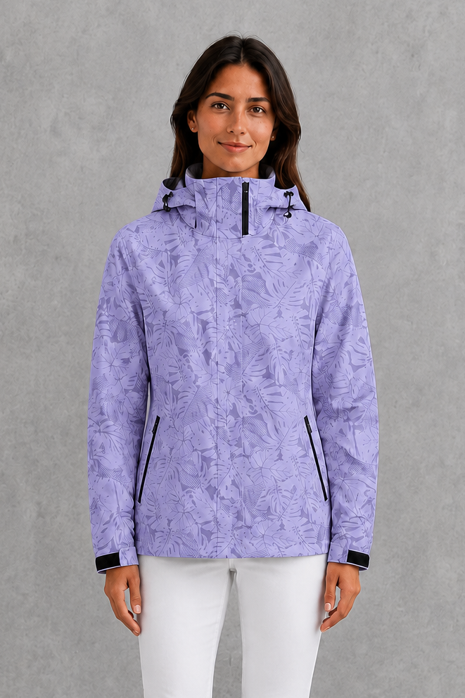Women’s leaf print hooded rain jacket with a botanical pattern, adjustable drawstring waist and lightweight waterproof, windproof construction.