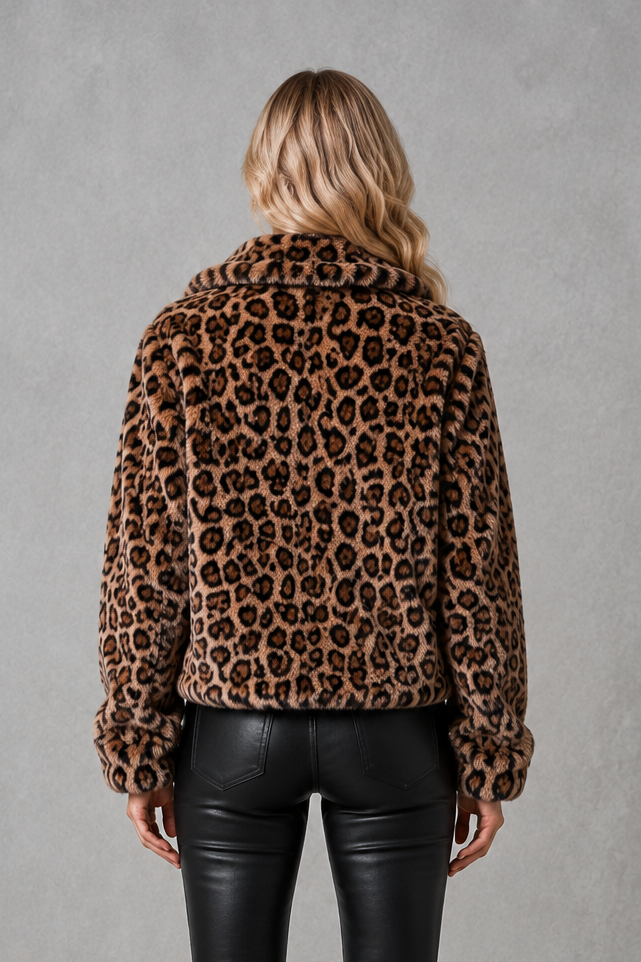 Women’s leopard print faux fur cropped jacket with a soft plush texture, relaxed fit, long sleeves, and bold animal print design.