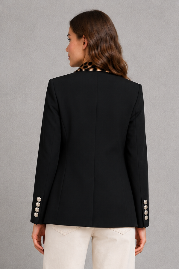Women’s leopard print longline cardigan with an all-over animal pattern, open-front design, long sleeves, soft stretch knit, and midi-length silhouette.