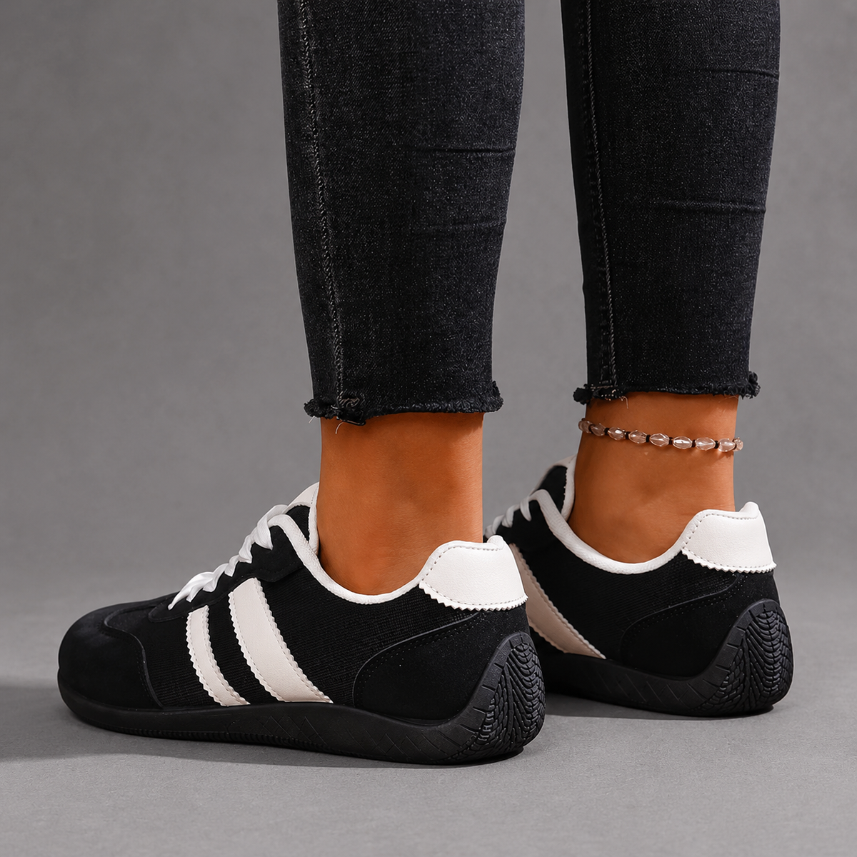Women’s lightweight lace-up sneakers with a low-top silhouette, soft fabric lining, cushioned insole, and flexible TPR outsole for everyday comfort.