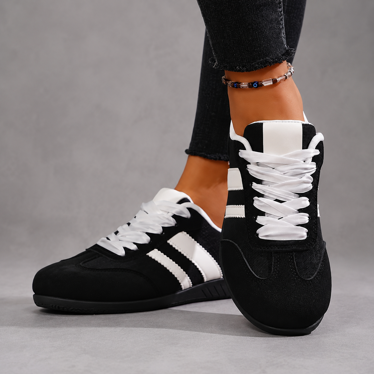 Women’s lightweight lace-up sneakers with a low-top silhouette, soft fabric lining, cushioned insole, and flexible TPR outsole for everyday comfort.