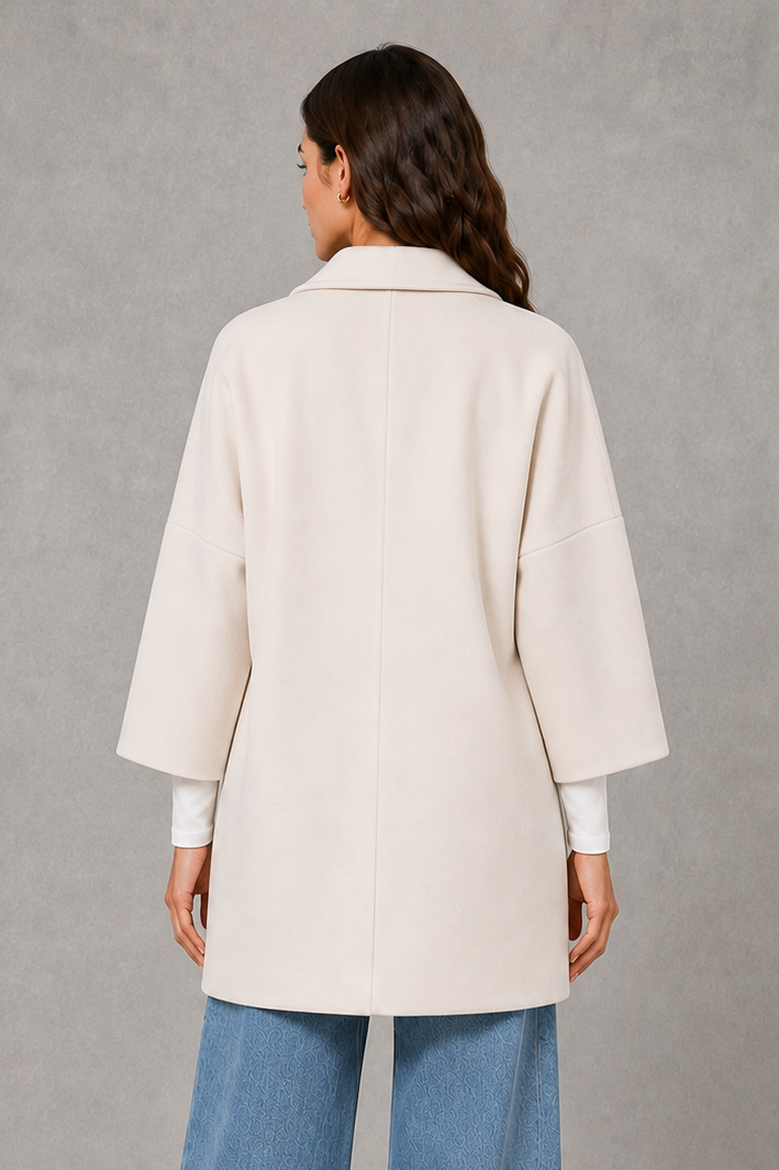 Women’s lightweight longline coat with a soft-touch finish and elegant streamlined silhouette for polished transitional layering.