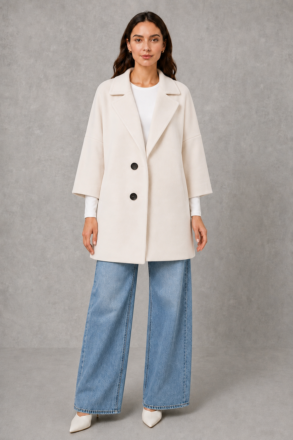 Women’s lightweight longline coat with a soft-touch finish and elegant streamlined silhouette for polished transitional layering.