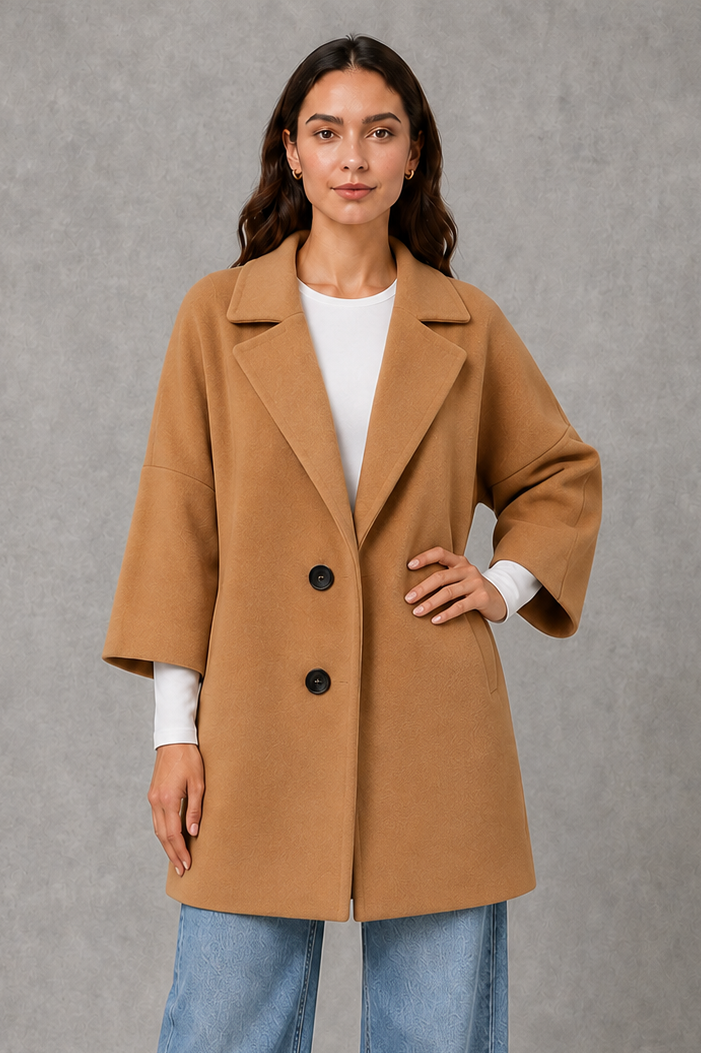 Women’s lightweight longline coat with a soft-touch finish and elegant streamlined silhouette for polished transitional layering.
