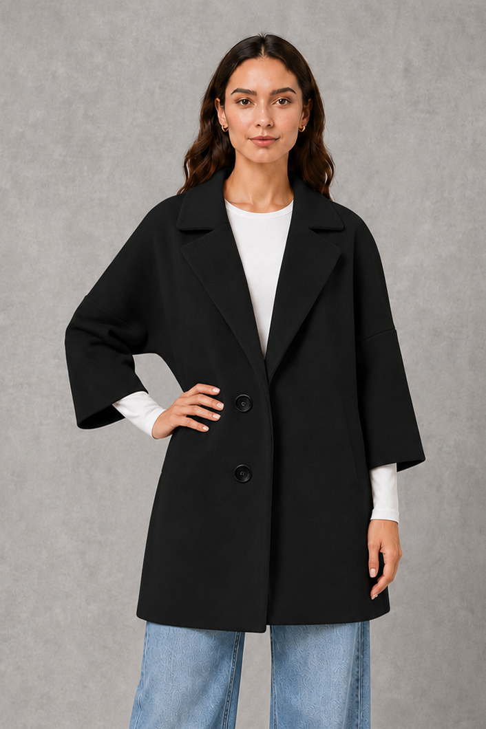 Women’s lightweight longline coat with a soft-touch finish and elegant streamlined silhouette for polished transitional layering.