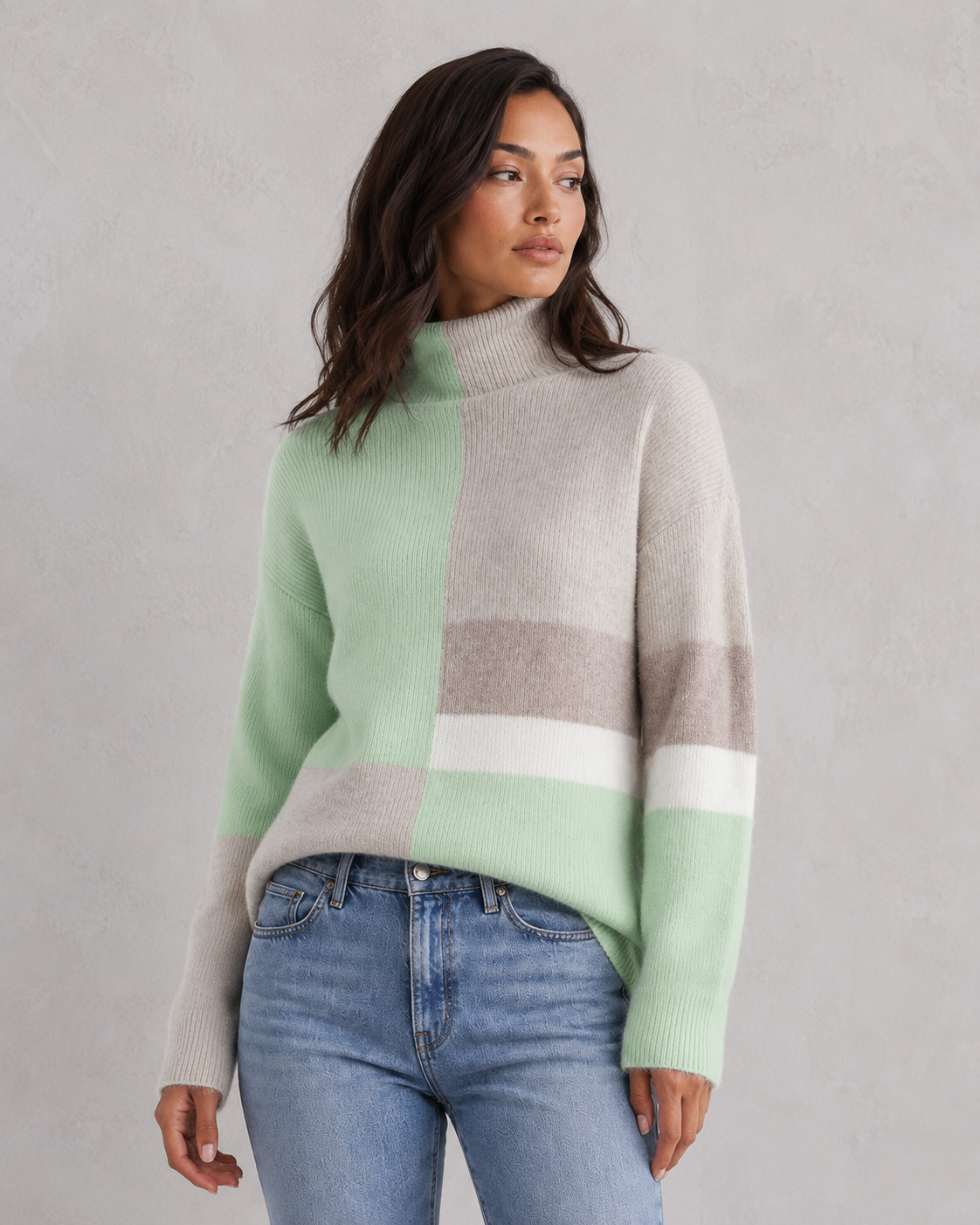 Women's lightweight turtleneck sweater in a soft, breathable knit with a streamlined, feminine silhouette. The minimalist design features a classic turtleneck neckline, long sleeves, and a polished drape that skims the body comfortably. Styled as a versatile wardrobe staple, suitable for layering under blazers or pairing with tailored trousers for an elegant everyday look.