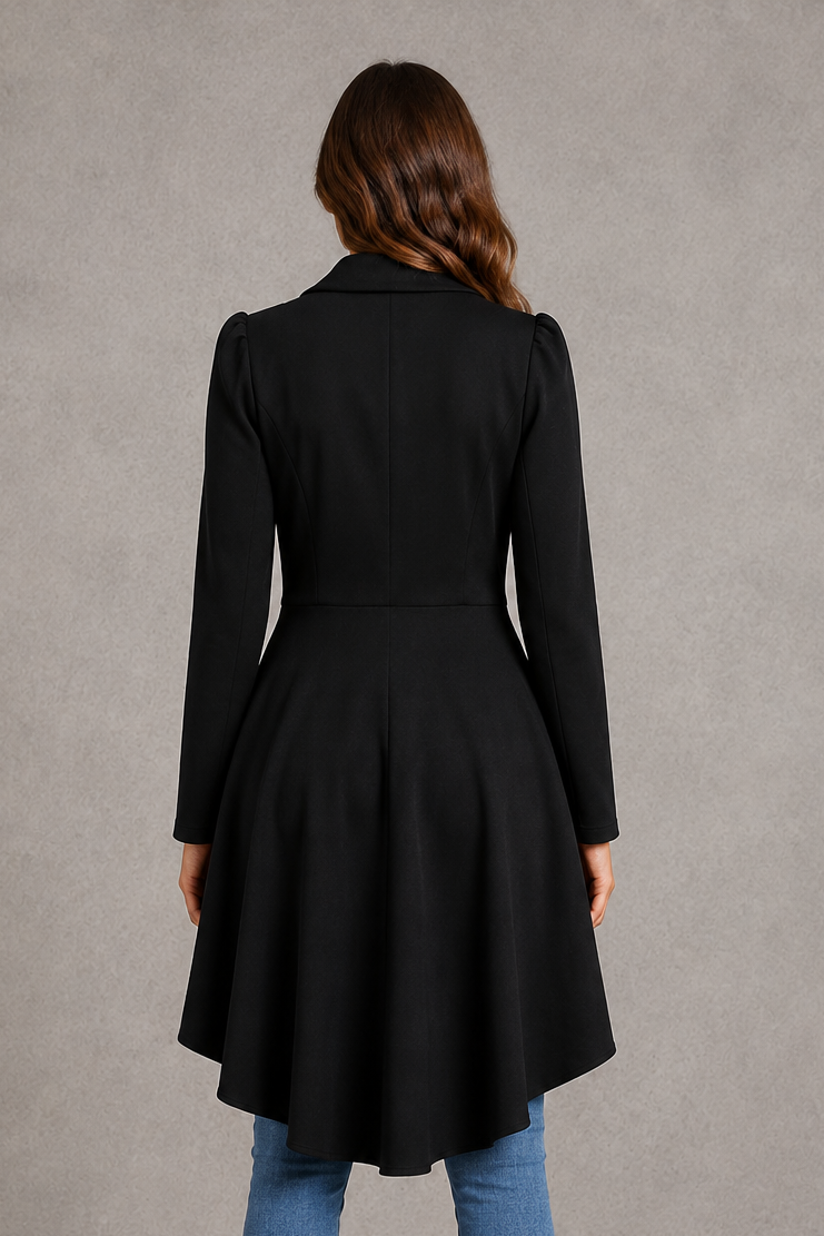 Women’s longline flared blazer with a classic lapel collar, tailored fit, extended length, soft lining, and flattering feminine flared hem.