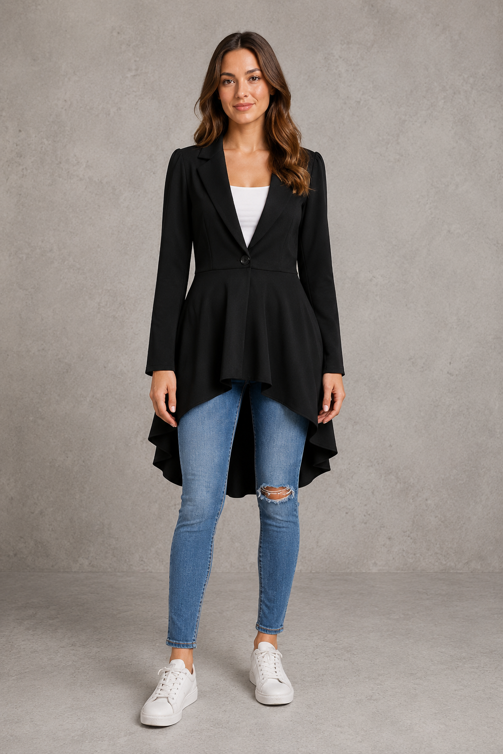 Women’s longline flared blazer with a classic lapel collar, tailored fit, extended length, soft lining, and flattering feminine flared hem.