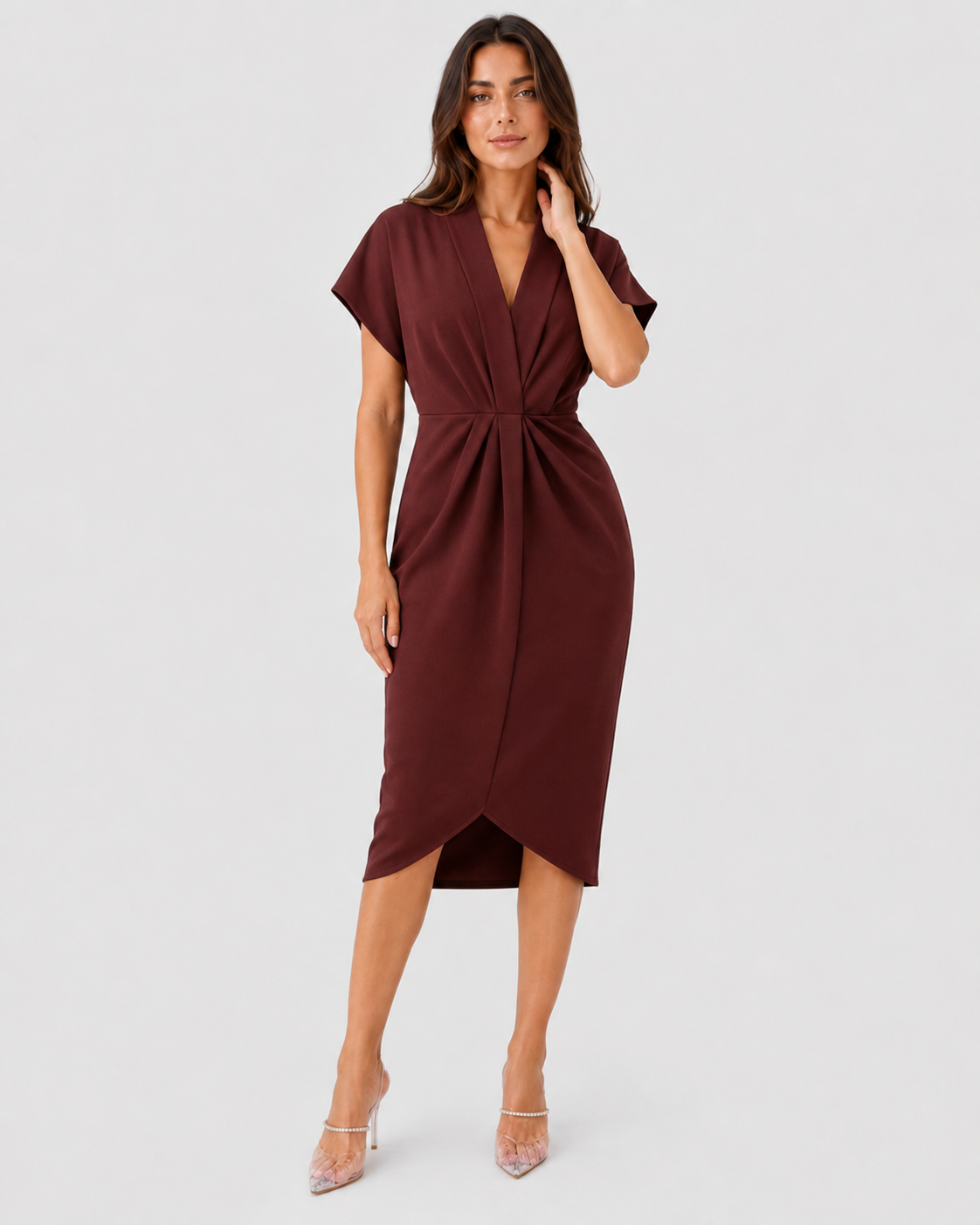 Women's luxe wrap midi dress in premium soft fabric with a flattering wrap silhouette that cinches the waist and flows gracefully below the knee, creating an elegant and sophisticated look for special occasions or everyday wear.
