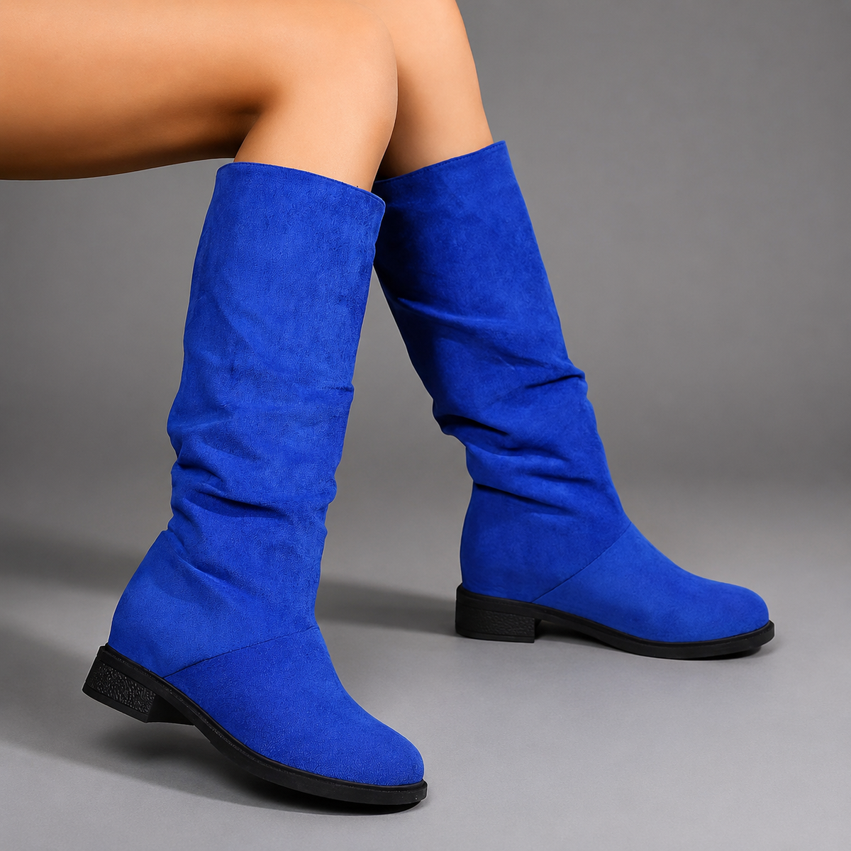 Women’s mid-calf casual winter boots with a durable synthetic upper, soft textile lining, and hard-wearing outsole for everyday wear.