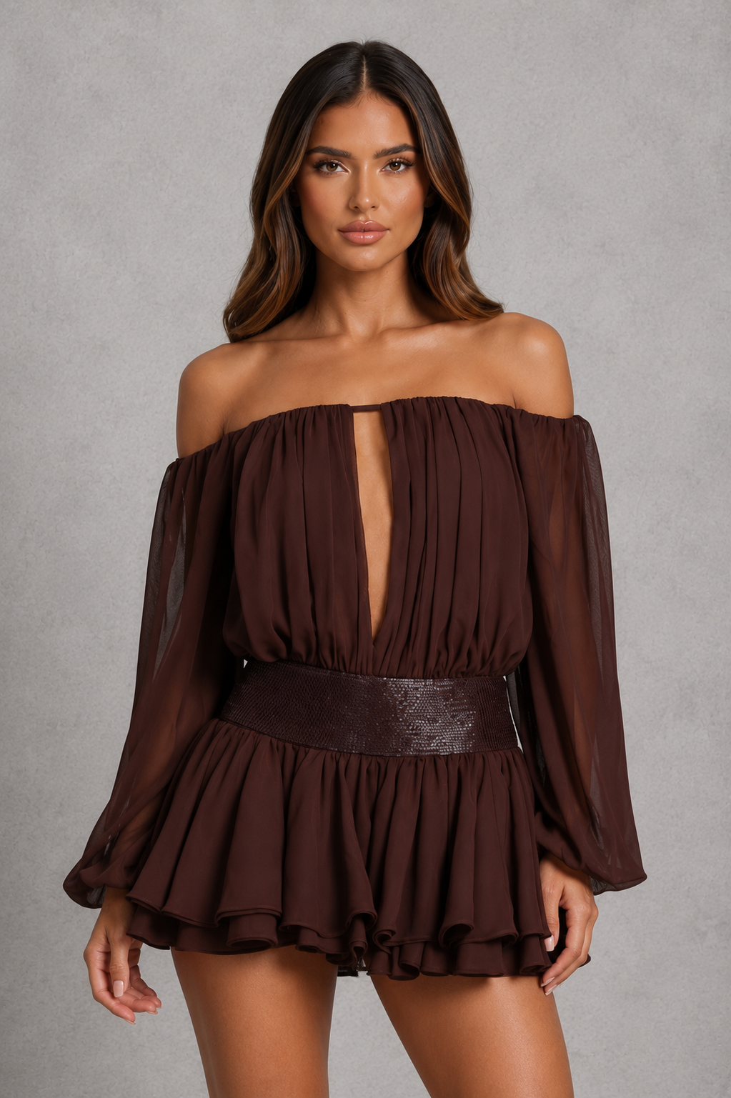 Women's Bardot chiffon playsuit with off-shoulder neckline, balloon sleeves, embellished waist, layered skirt overlay, and built-in shorts.