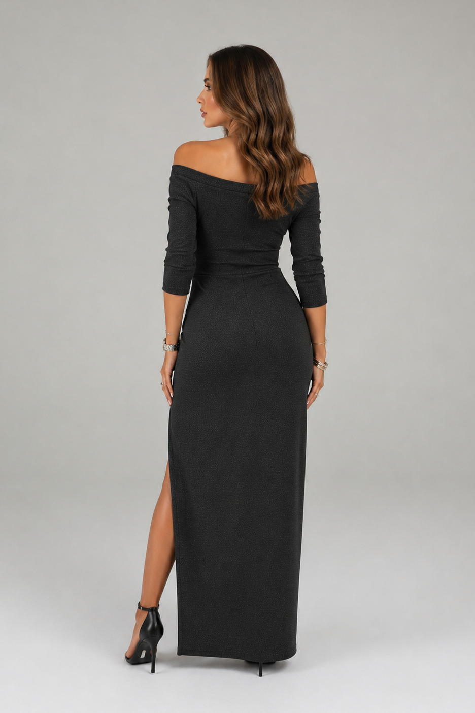 Women’s off-shoulder ruched midi dress in subtly shimmering fabric, featuring a fitted bodice, elbow-length sleeves, side ruching, a front slit, and a flattering form-fitting silhouette with a gently flared skirt.