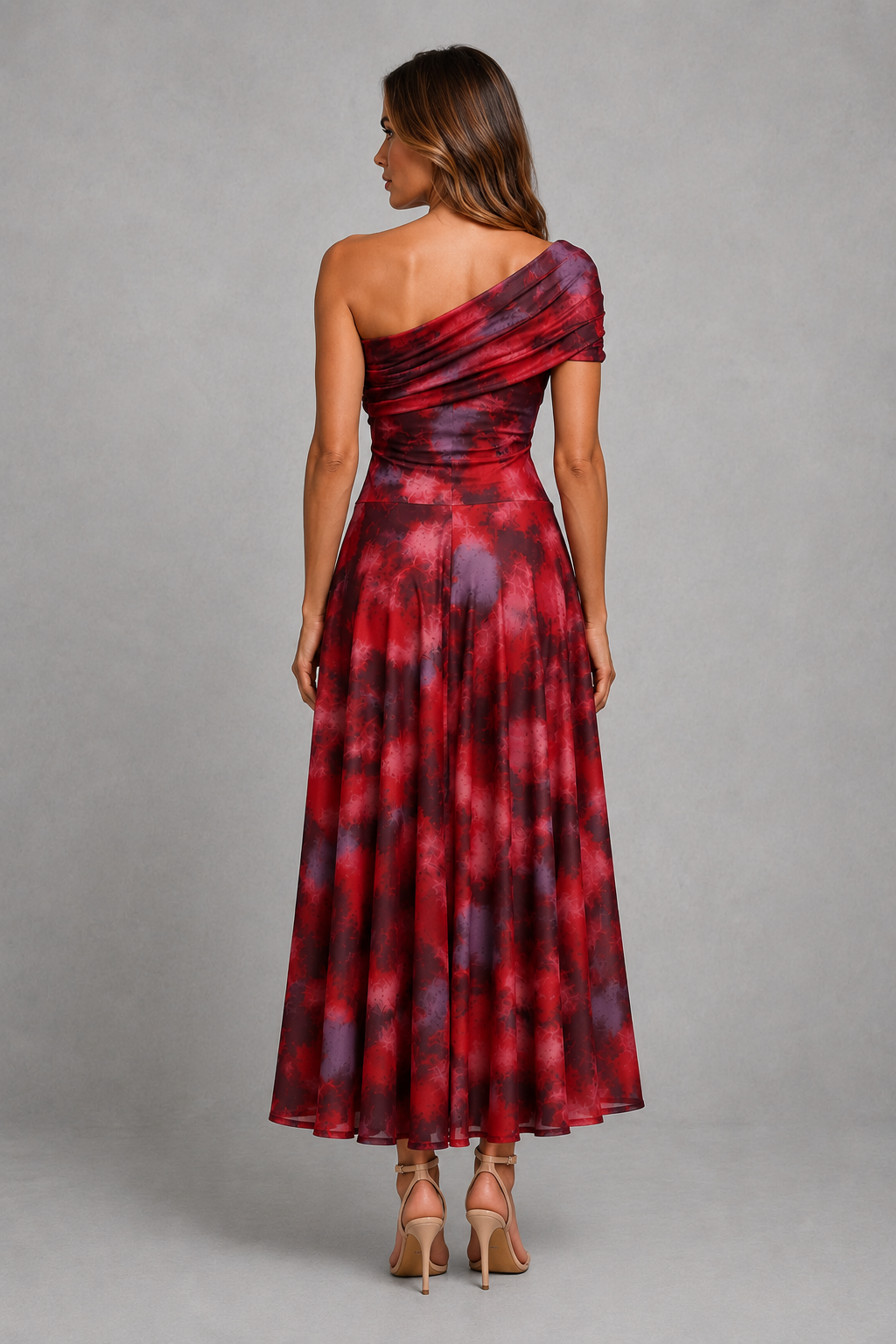 Women’s one-shoulder maxi dress with draped neckline and abstract burgundy and rose print, featuring a fitted waist and flowing full-length skirt.