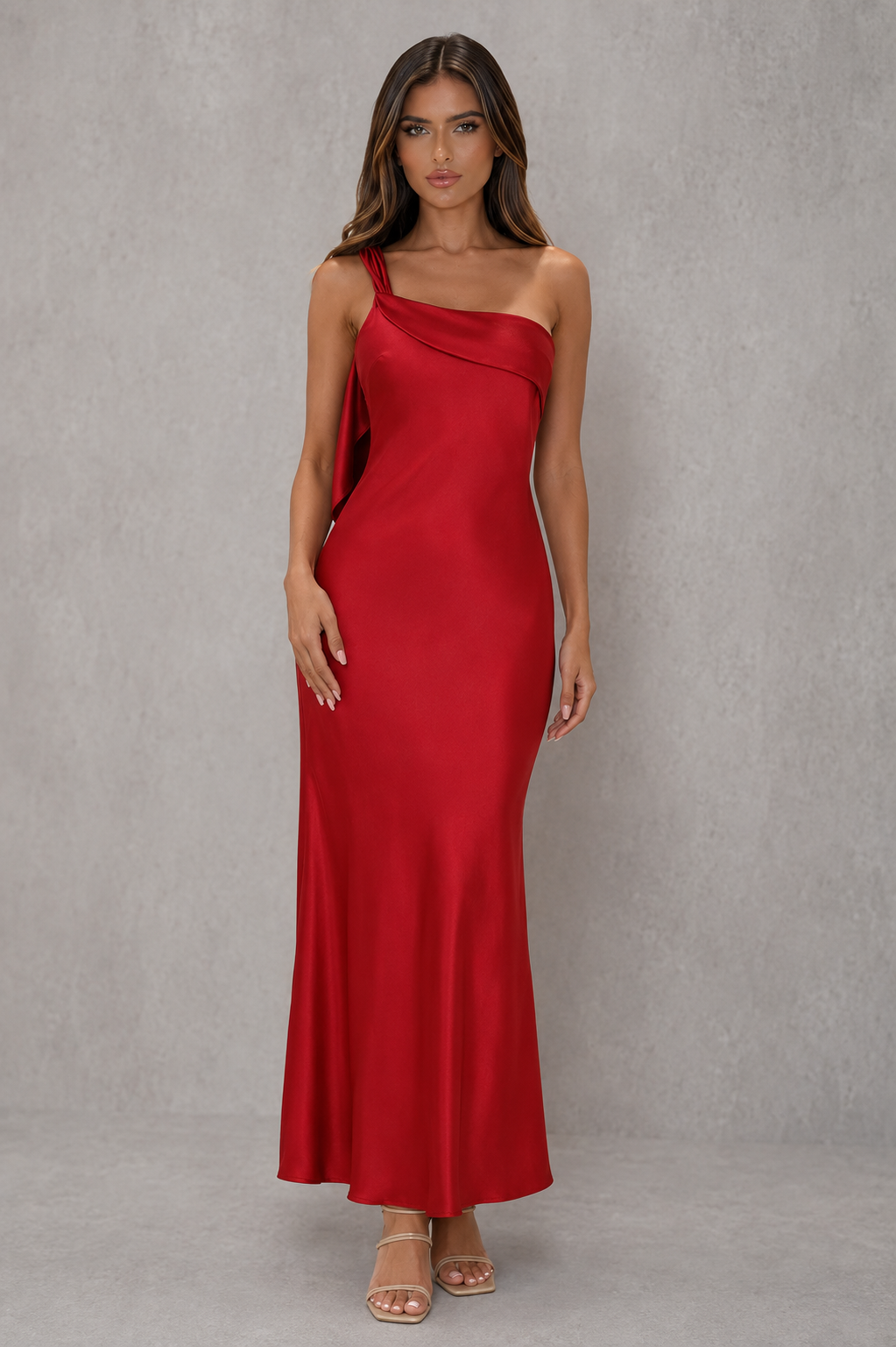 Women’s one-shoulder satin maxi dress with a flowing silhouette and statement ruffle detail along the back shoulder strap.