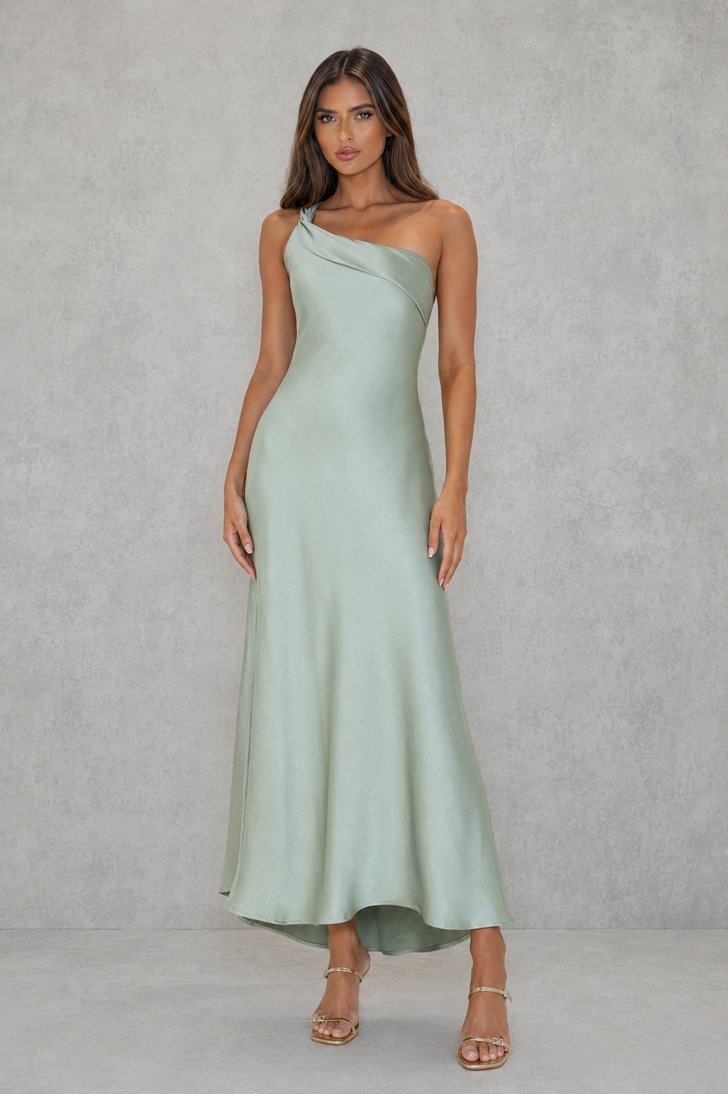Women’s one-shoulder satin maxi dress with a flowing silhouette and statement ruffle detail along the back shoulder strap.