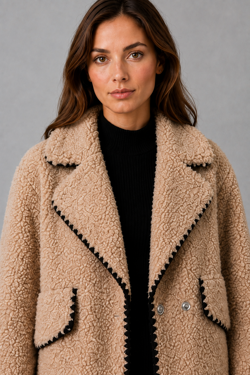 Women’s open-front sherpa fleece jacket with a soft teddy-style texture, turn-down collar, relaxed fit, and subtle contrast detailing.