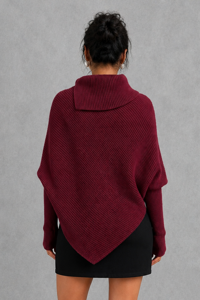 Women’s burgundy oversized batwing sweater with a cozy high neck, long relaxed sleeves, rib-knit texture and modern asymmetrical split hem.