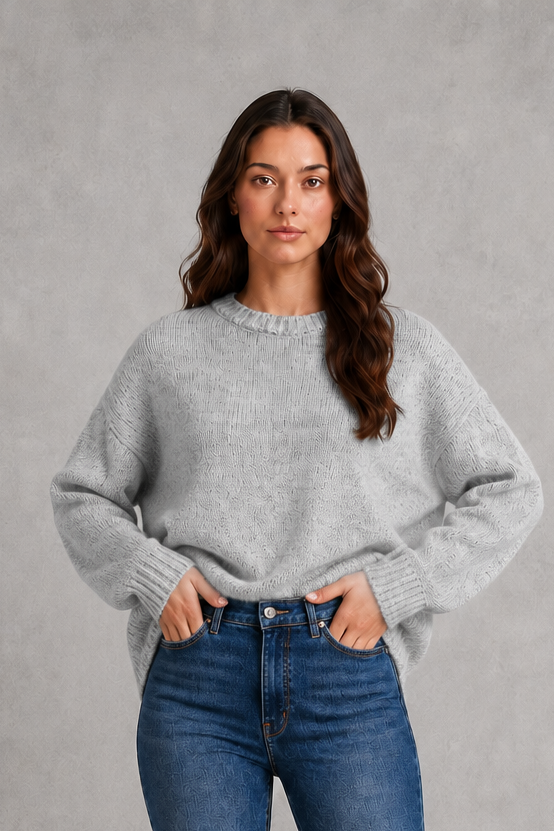 Women’s light gray oversized crew neck knit sweater with dropped shoulders, wide long sleeves, and a relaxed slouchy pullover silhouette.