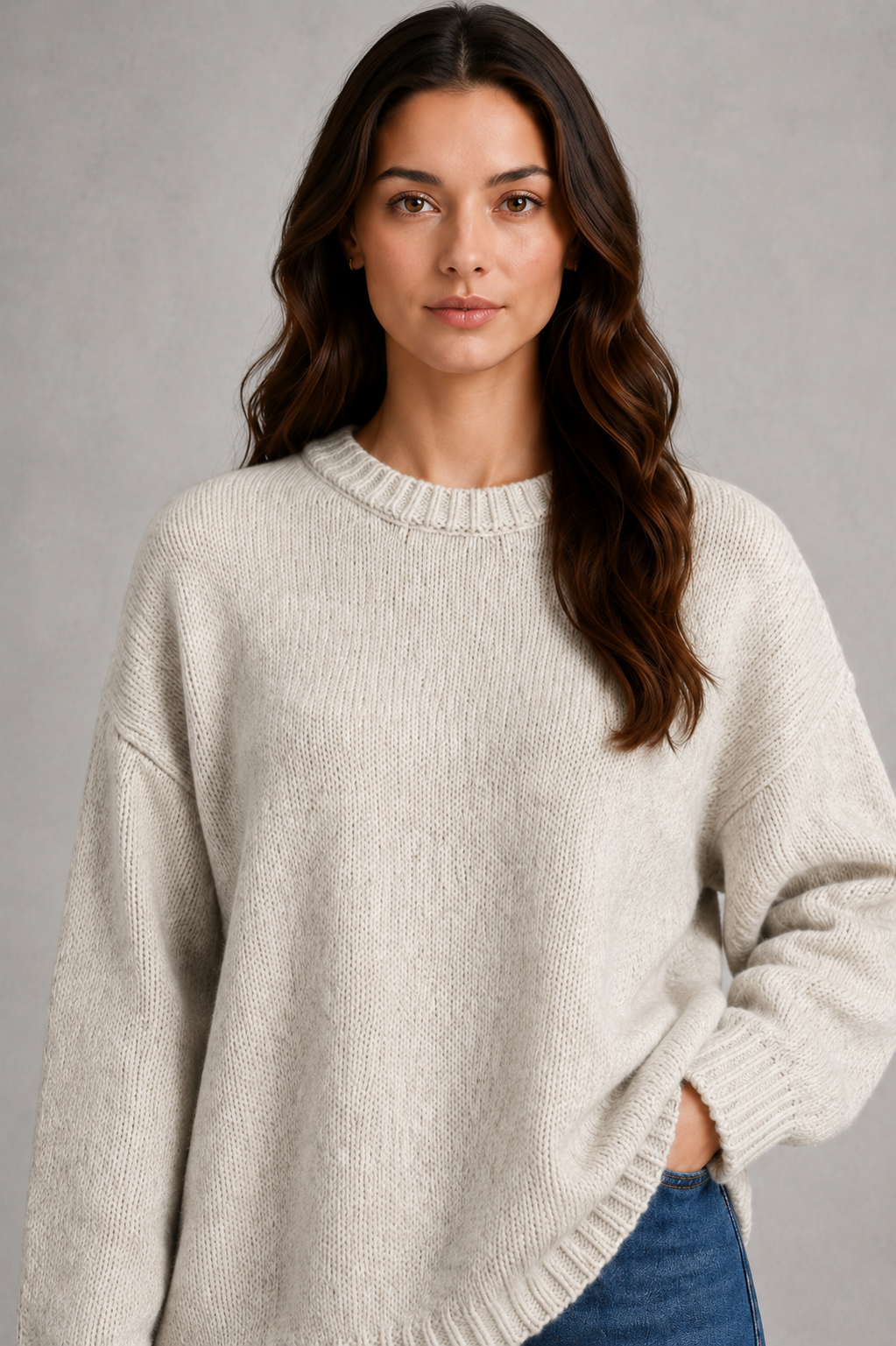 Women’s light gray oversized crew neck knit sweater with dropped shoulders, wide long sleeves, and a relaxed slouchy pullover silhouette.