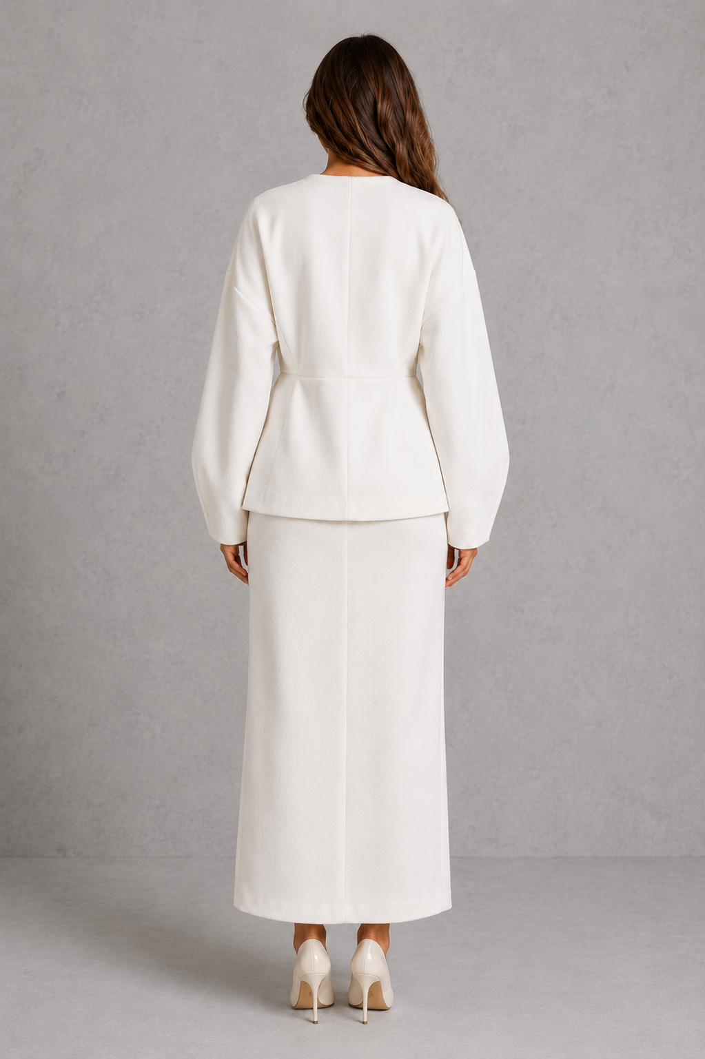 Women’s peplum jacket and maxi skirt set with a deep V-neck, fitted waist, double-button detail, voluminous sleeves, and coordinating pencil skirt.