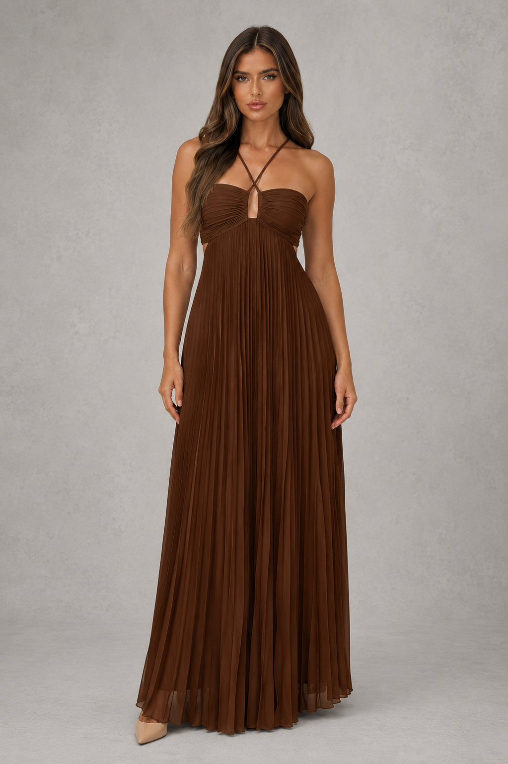 Women’s pleated halterneck maxi dress with crossover neckline, open back, adjustable tie closure and flowing full-length silhouette.