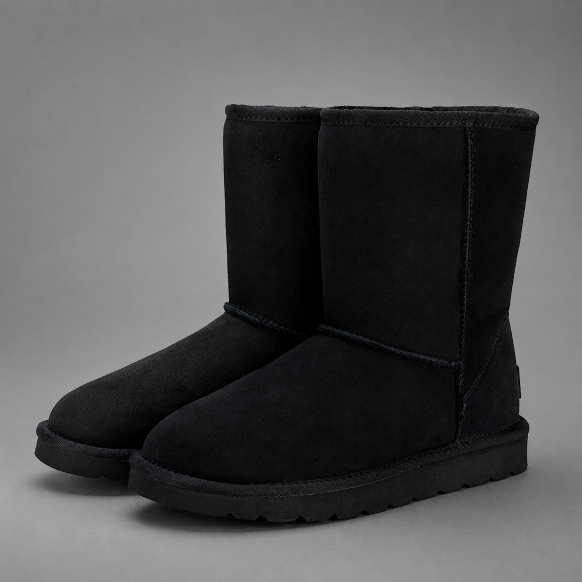 Women’s plush-lined mid-calf snow boots with a soft cotton upper, corduroy shaft, cozy interior, round toe and easy slip-on design.